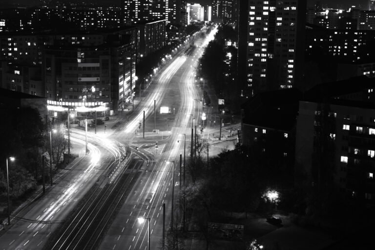 Modern,Urban,City,At,Night,With,Freeway,Traffic,,Black,And